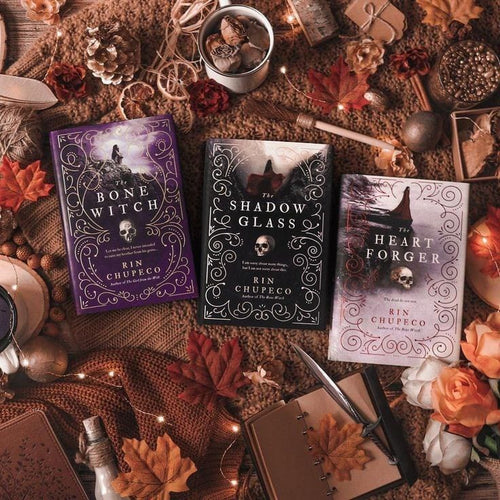 The Bone Witch = The Shadowglass  = The Heart Forger